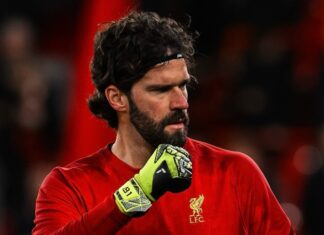 Liverpool’s new goalkeeper will first shake Alisson’s hand – then send the world’s best goalkeeper straight to the substitutes’ bench