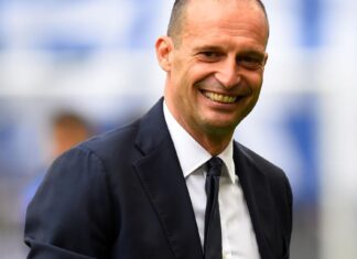 Max brushes the dust off the suit