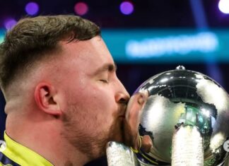 Newly crowned world champion Luke Littler signs the all-time sponsorship deal