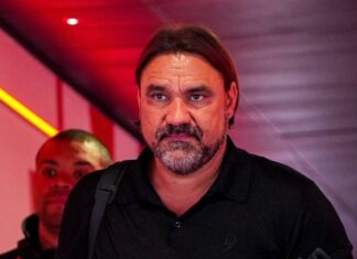 Success coach Daniel Farke prepares his signature pen at Leeds